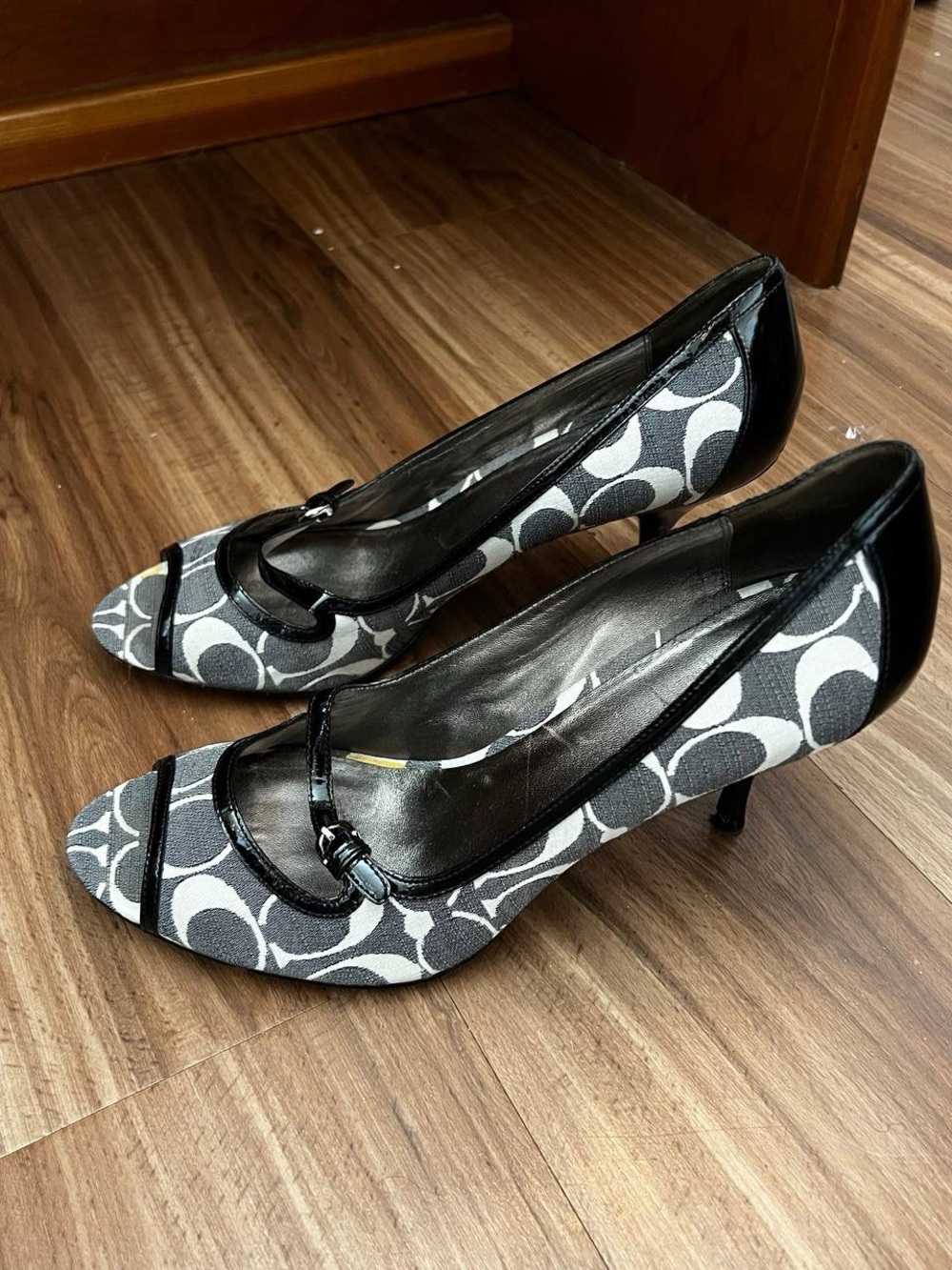 Coach Black and White Signature Kitten Heel Pumps